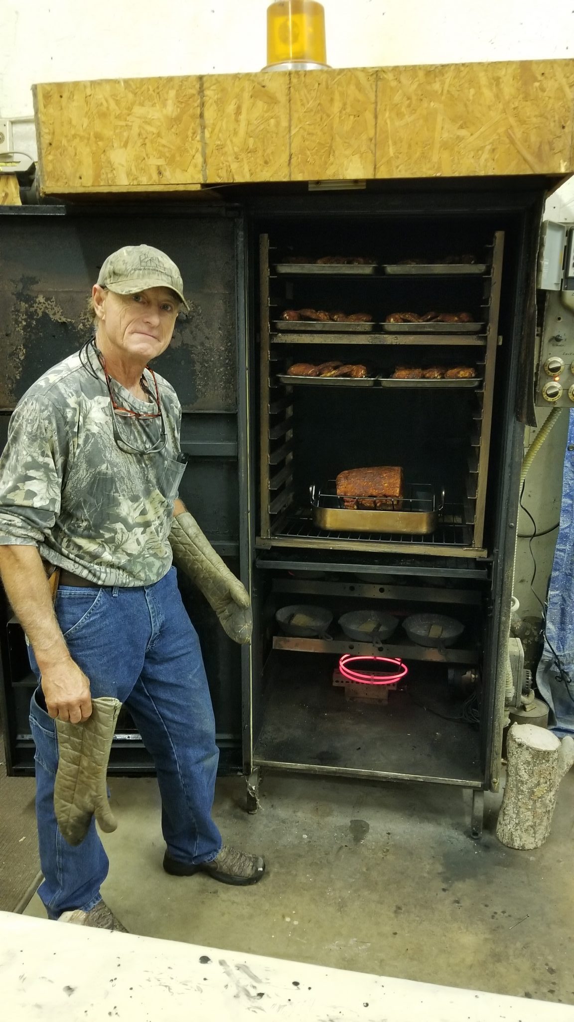 The smoker can hold twenty-four chickens.