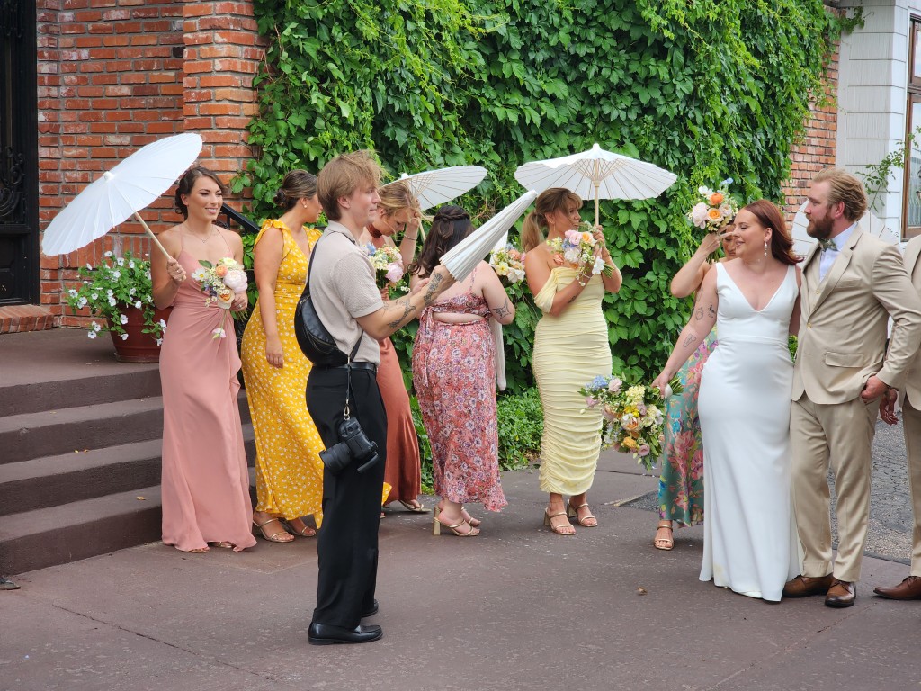 Posing with parasol umbrellas